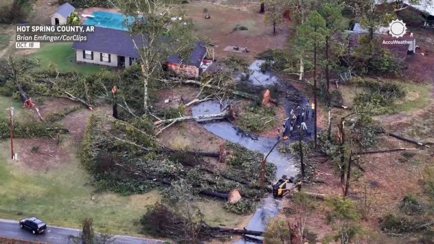 Drone footage shows trees down and on a home near De Roche, Arkansas on Oct. 18, 2025. (CorClips/Brian Emfinger)